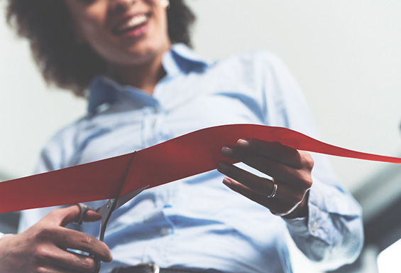 cutting the ribbon of success