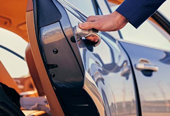 man opening car door