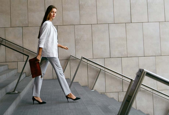 woman walking down a staircase