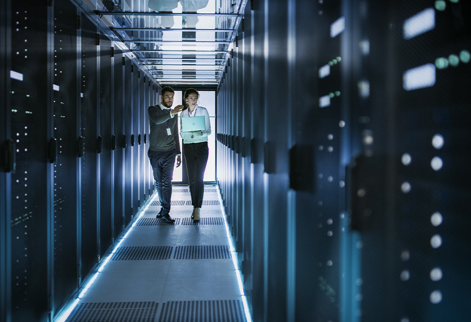 two people looking at servers